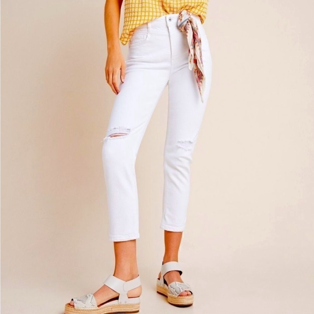 Pilcro high rise slim distressed white jeans. Distressed areas by design.